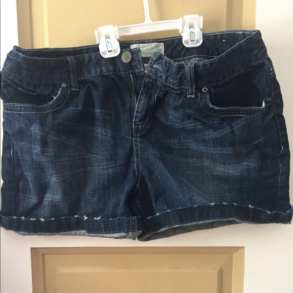 Jean shorts with distressed hem line.